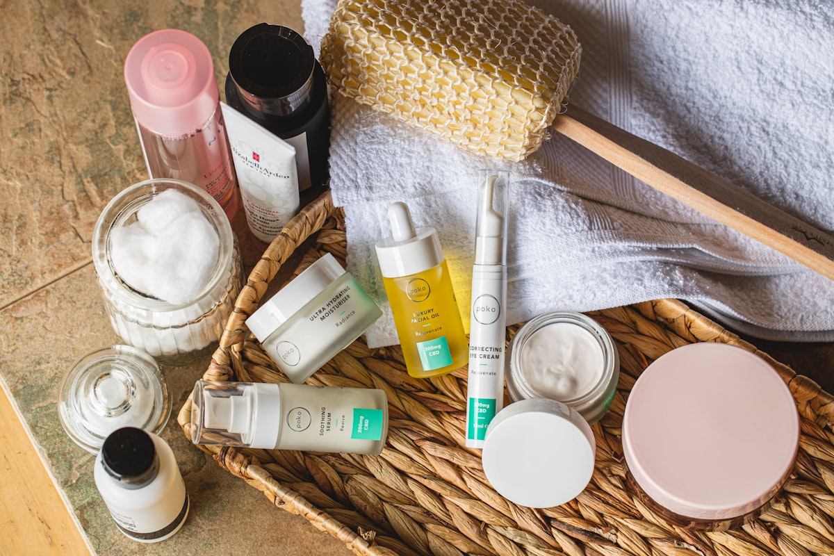 Bathroom shelf lined with anti-aging skincare products including serums and moisturizers